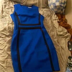 Dark blue dress worn